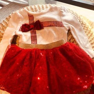 Baby girl with sparkling red tutu  6-9 months old